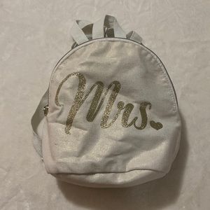 White ‘Mrs.’ small backpack, with gold detail